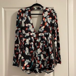 Long sleeve romper. Purchased at Once Upon a Skirt (boutique in NJ)